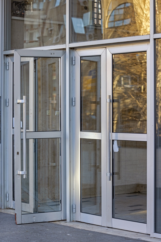 Modern impact-resistant glass entry door installed on a residential home in Indio