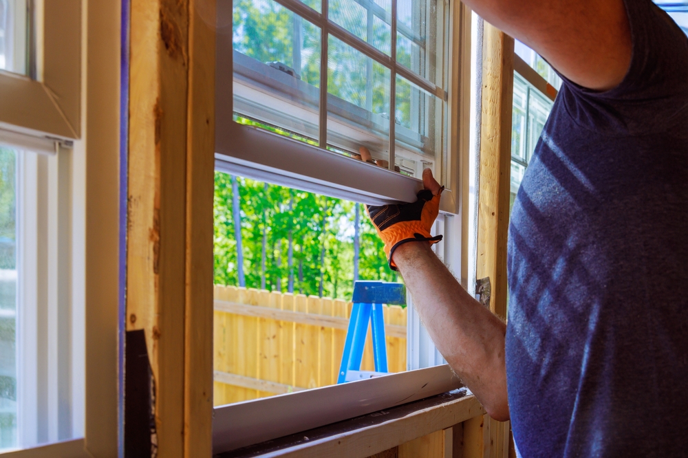 Energy-efficient replacement windows helping lower utility bills in a modern home