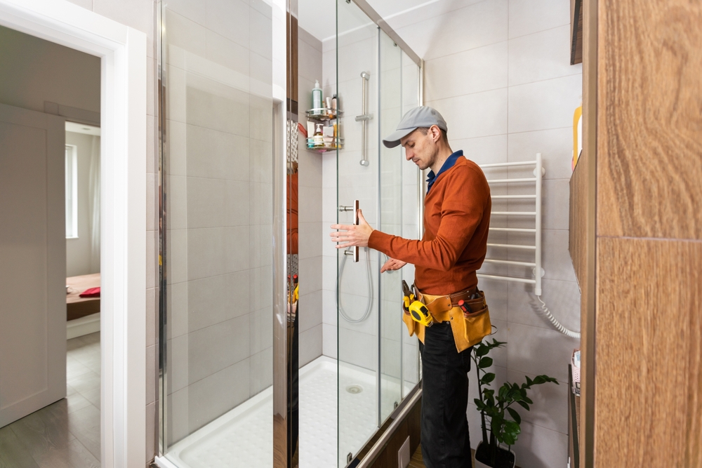 Frameless vs framed shower doors compared in a modern bathroom
